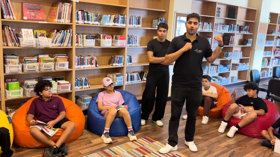 Overflow engineers speaking to students in the school library